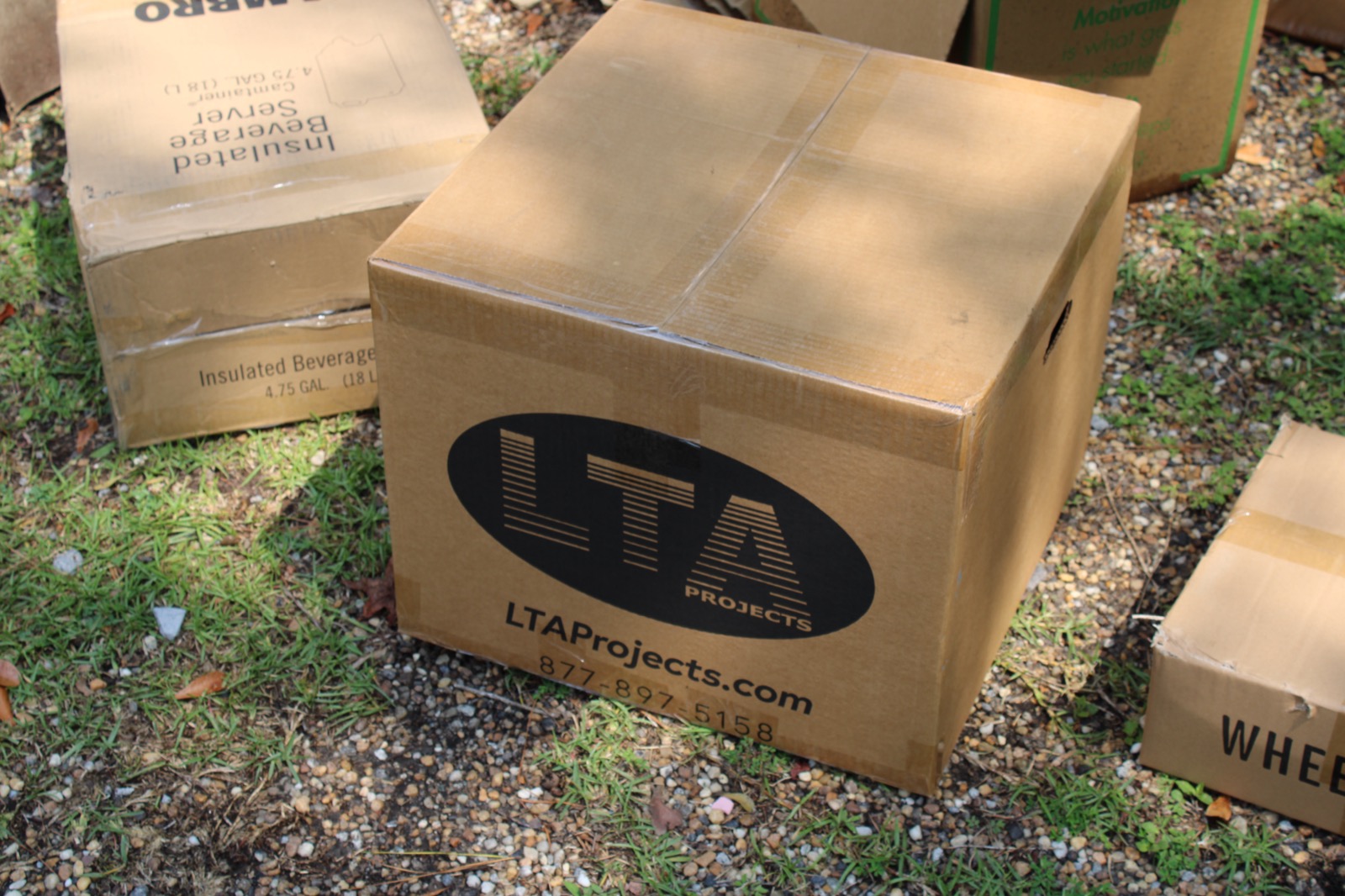 A sealed emergency supplies box from LTA Projects, part of the trailer's stocked inventory.