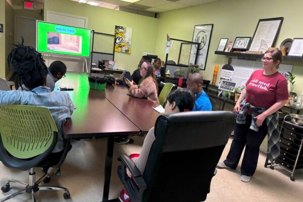 LIT members sitting at the conference table during one of our lessons.