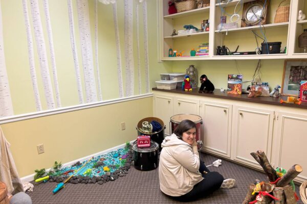 A LIT member sitting in the camping room at Scotty's Place.