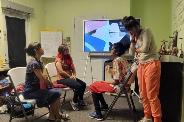 Summer session attendees learning proper interviewing techniques.