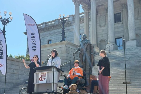 Advocacy Day guest speakers on the steps of the state capital in columbia south carolina.